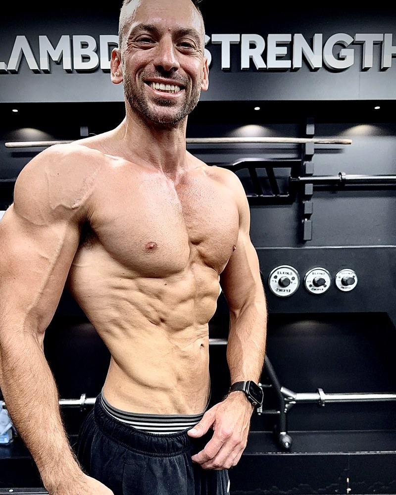 Bojan Kostevski, lean and conditioned, in the Lambda Strength gym — the method run on himself